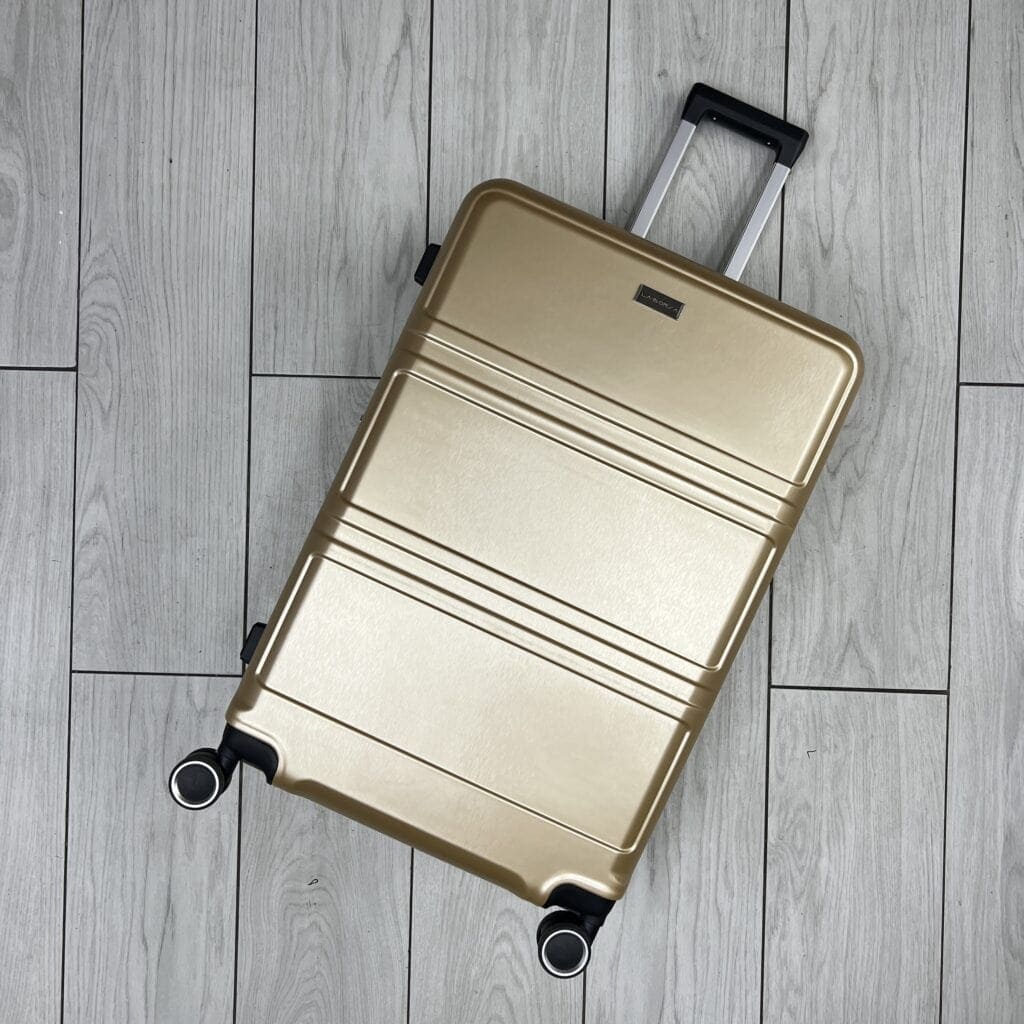 מזוודה קשיחה זהב
